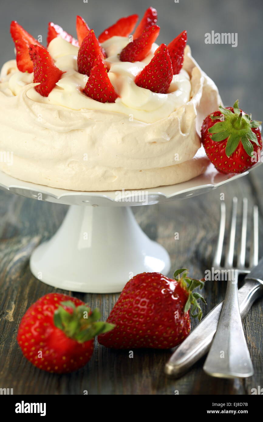 Meringue with whipped cream and strawberries Stock Photo Alamy