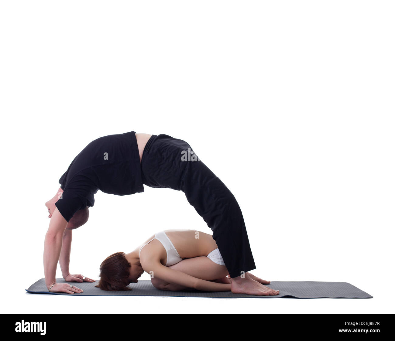 Image of flexible trainers practicing yoga Stock Photo