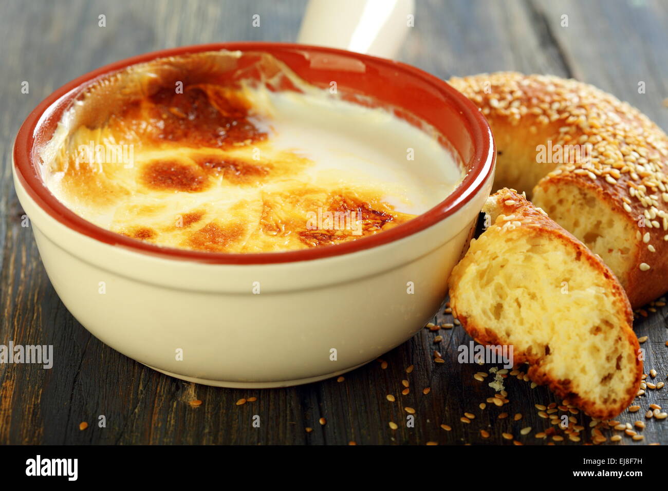 Homemade fermented baked milk and bagel. Stock Photo
