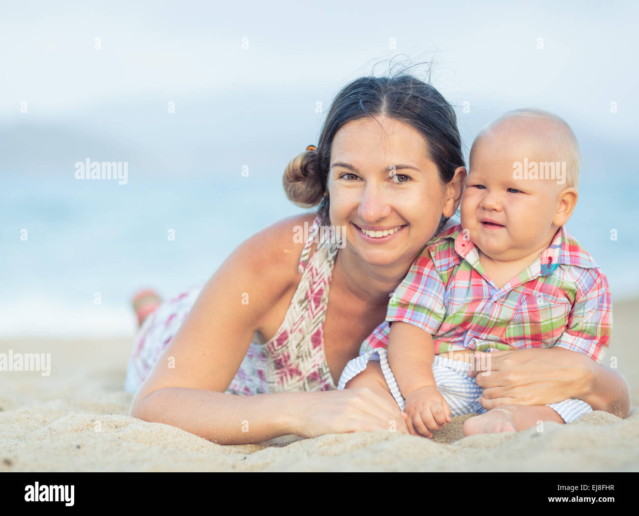 Baby and mother Stock Photo - Alamy