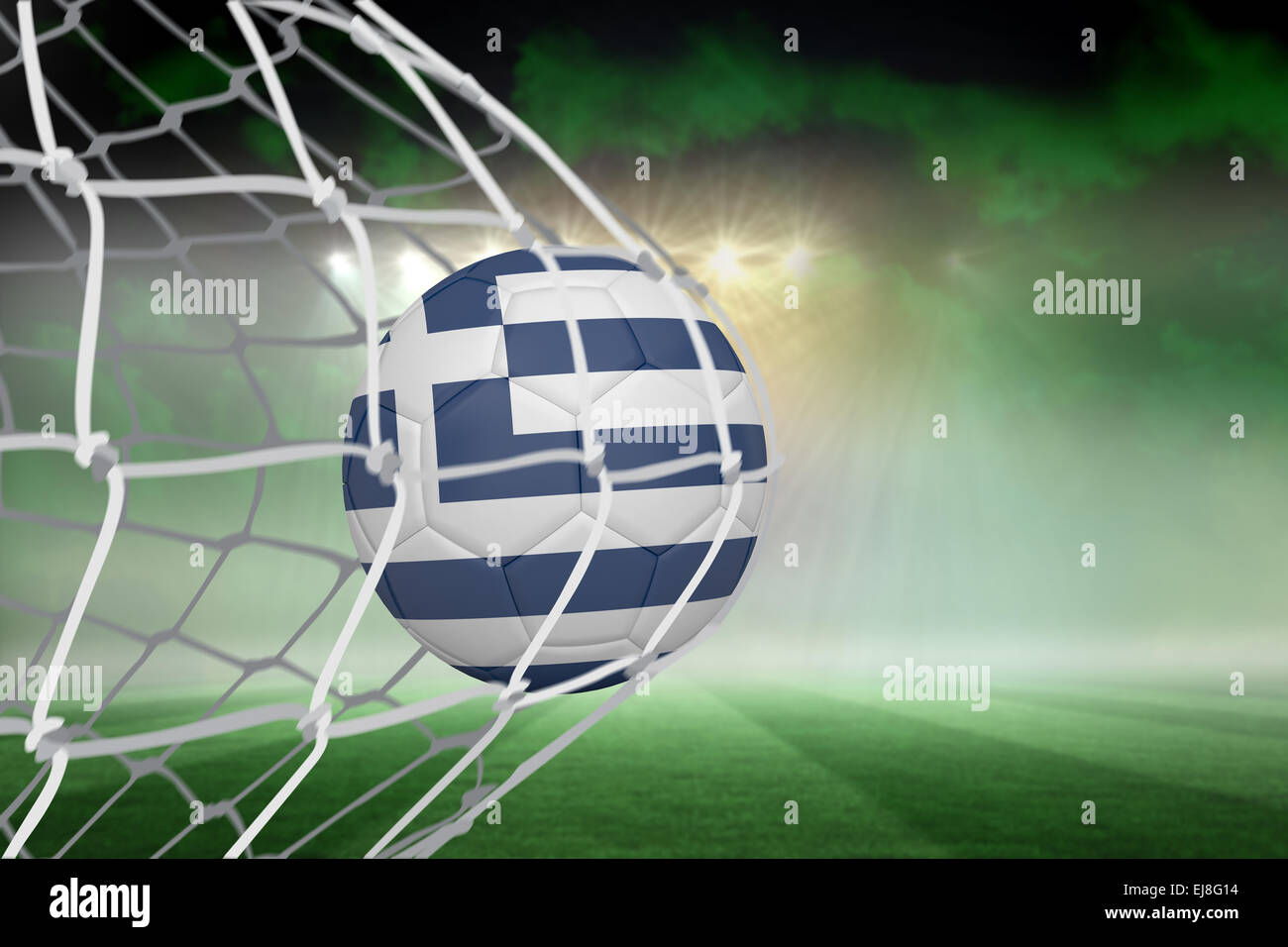 Football in greece colours at back of net Stock Photo Alamy