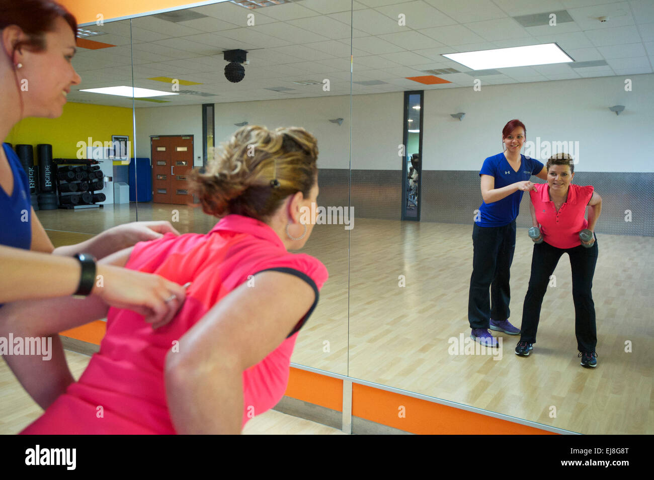 The Netherlands. Naaldwijk. 21-01-2015. Fitness with a personal trainer. Stock Photo