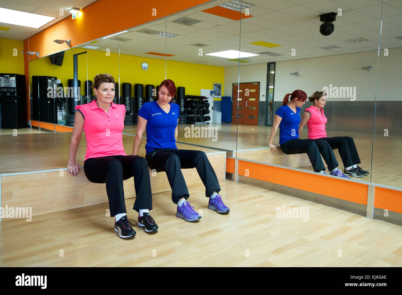 The Netherlands. Naaldwijk. 21-01-2015. Fitness with a personal trainer. Stock Photo