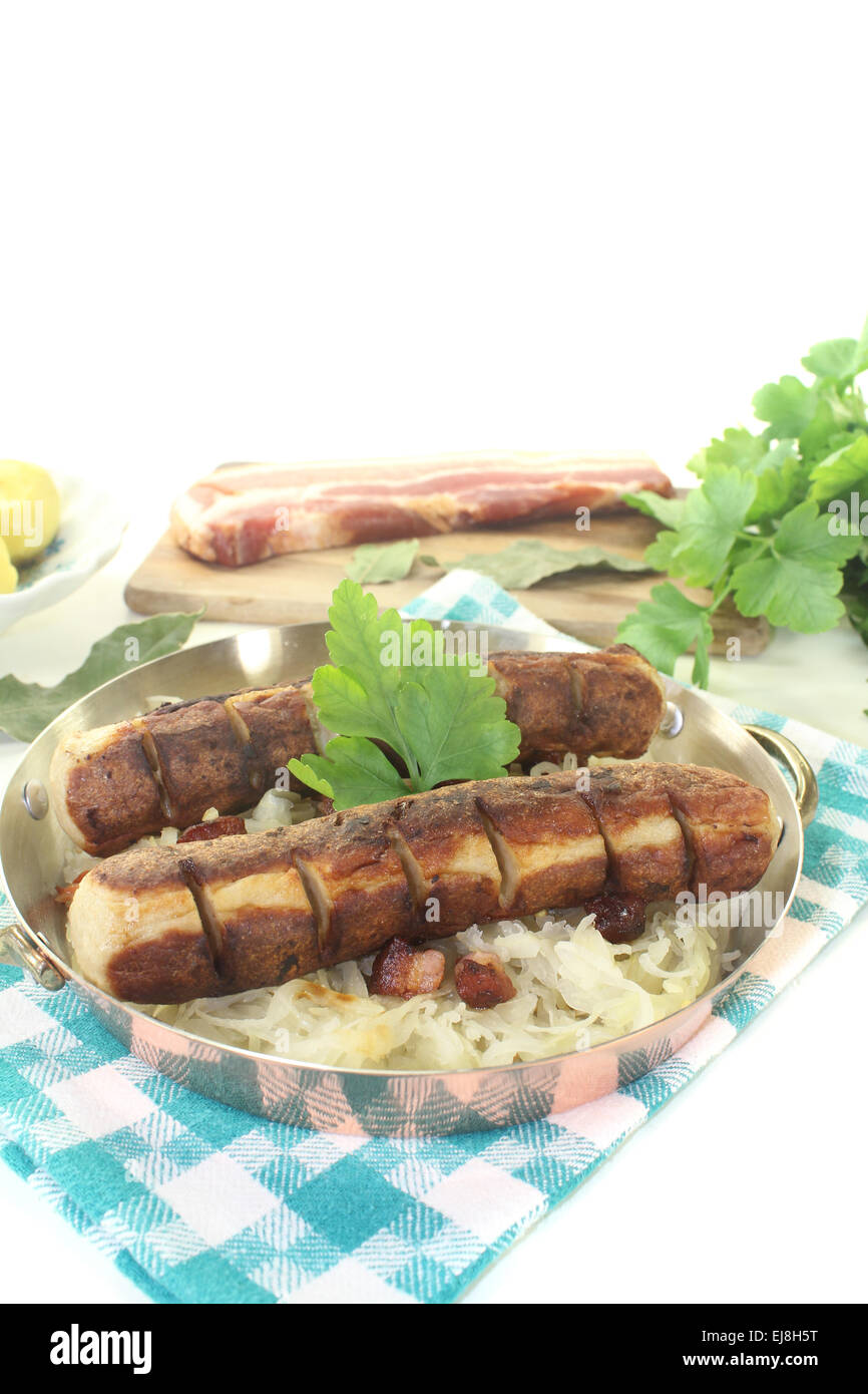 Bratwurst with Sauerkraut and potatoes Stock Photo Alamy