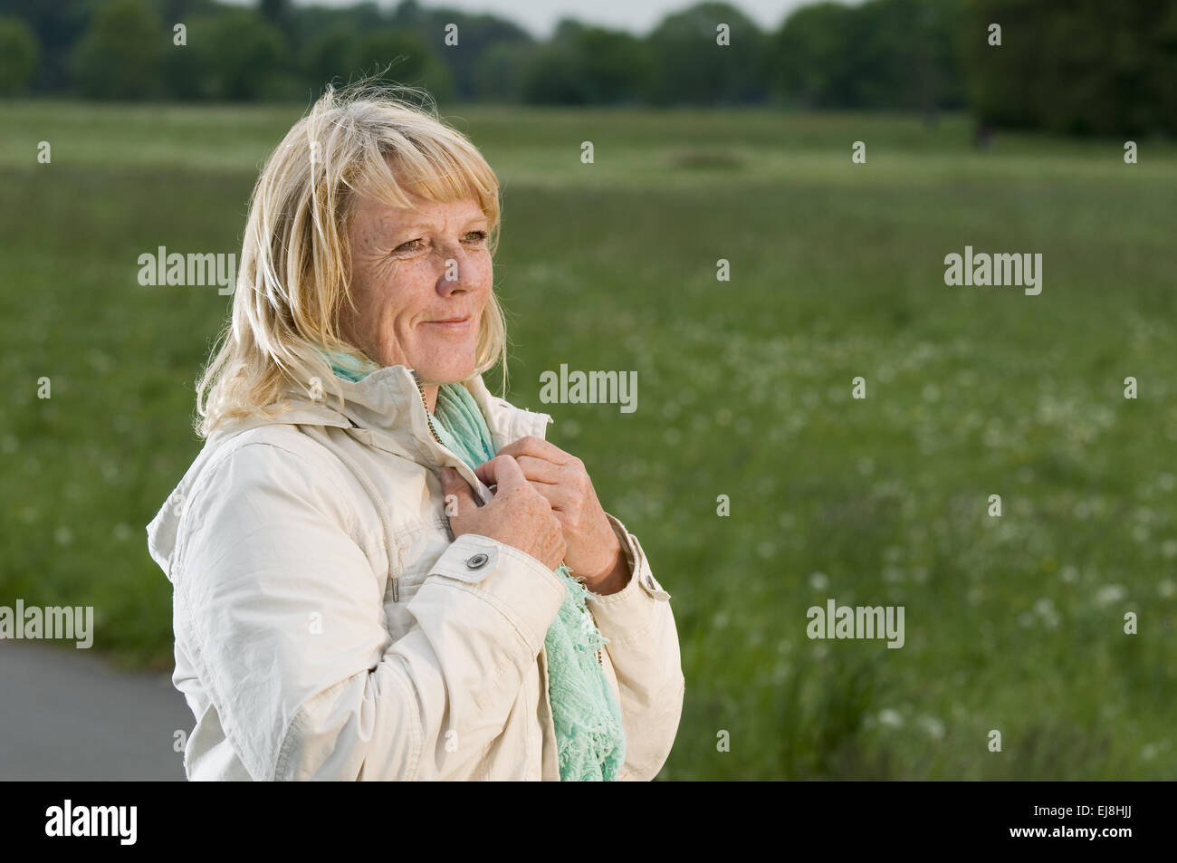 mature woman on a footpath Stock Photo