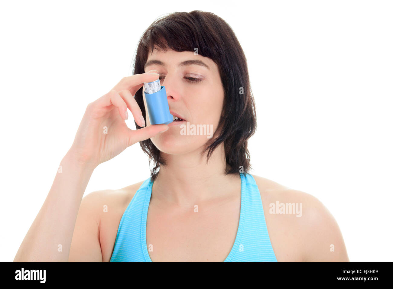 Close up image of a young woman using inhaler Stock Photo Alamy