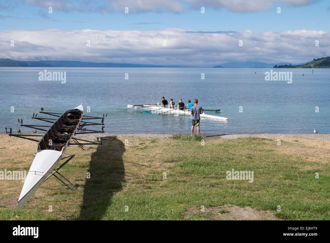 Rowers on lake Taupo in New Zealand. Stock Photo