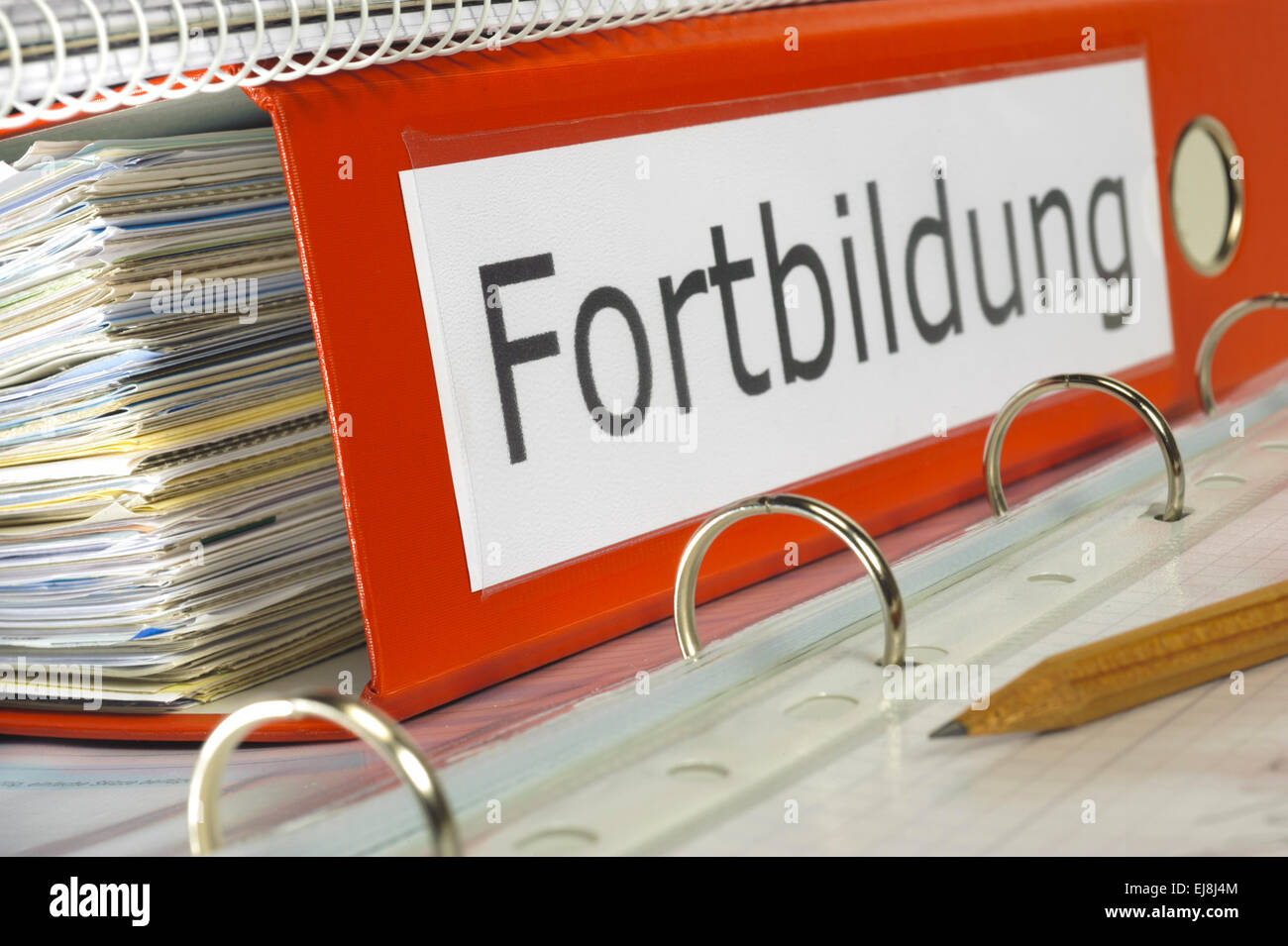 Fortbildung marked on german file folder Stock Photo