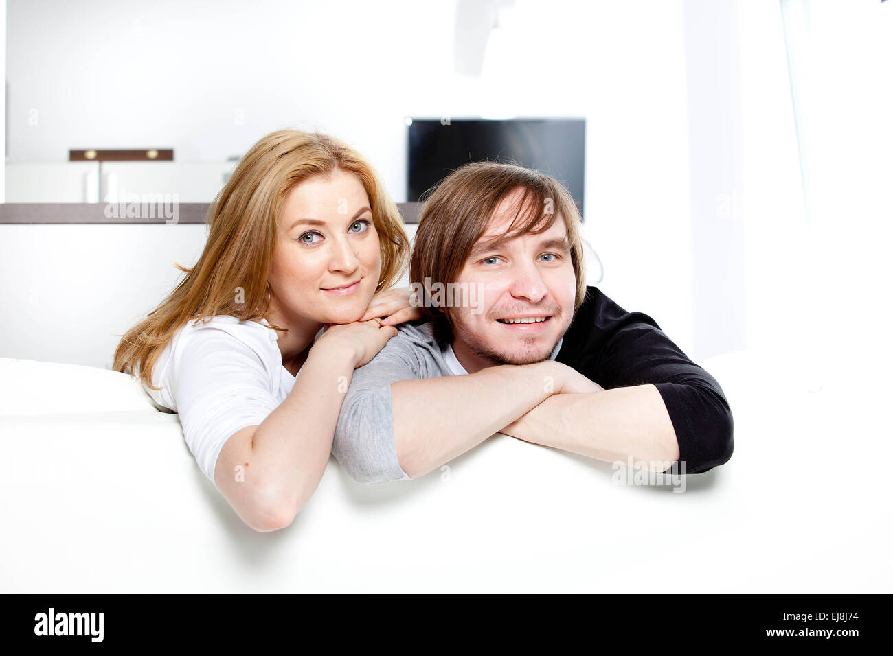 Couple in new home Stock Photo - Alamy
