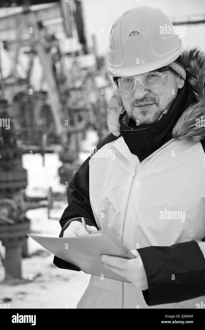 Worker in an Oil field Stock Photo Alamy