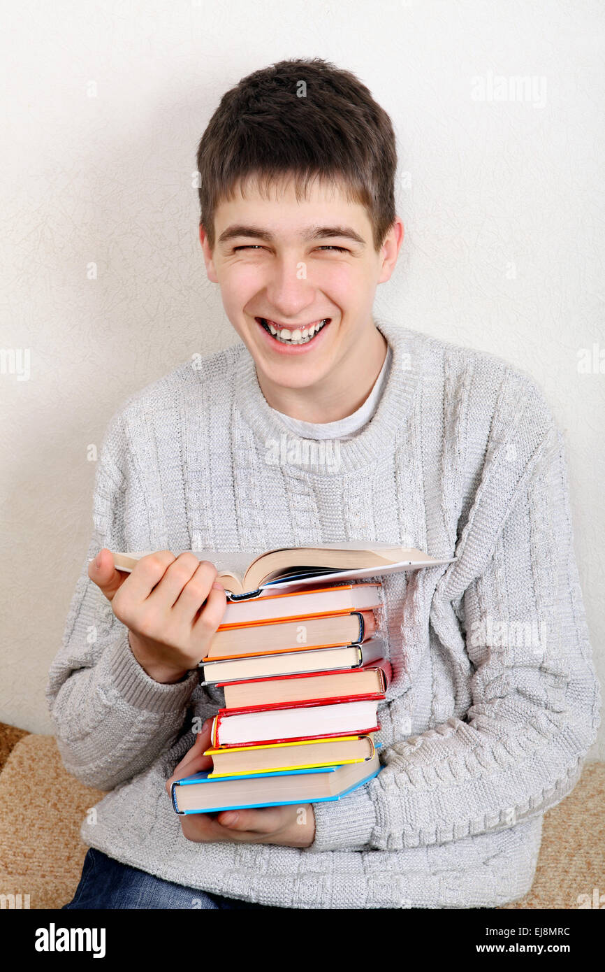 Cheerful Teenager with a Books Stock Photo