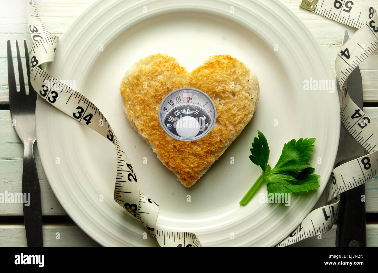 Diet concept weighing scales Stock Photo