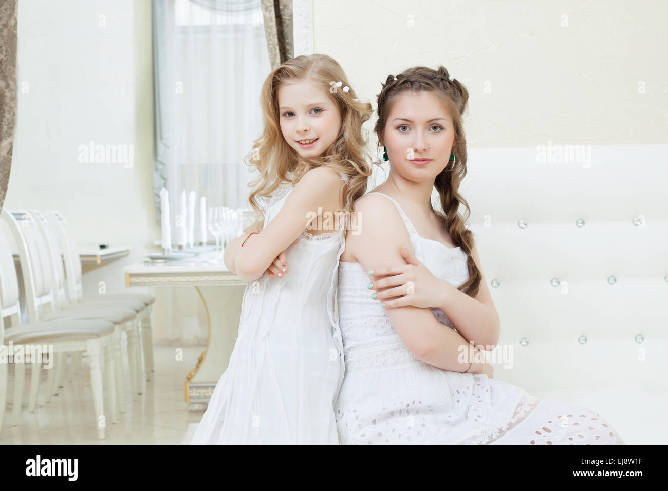 Lovely young models posing in restaurant Stock Photo - Alamy