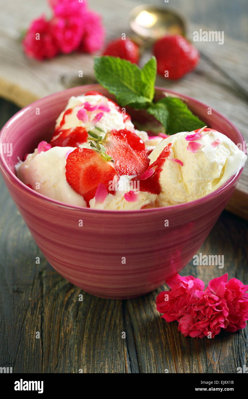 Ice cream with strawberries and mint Stock Photo - Alamy