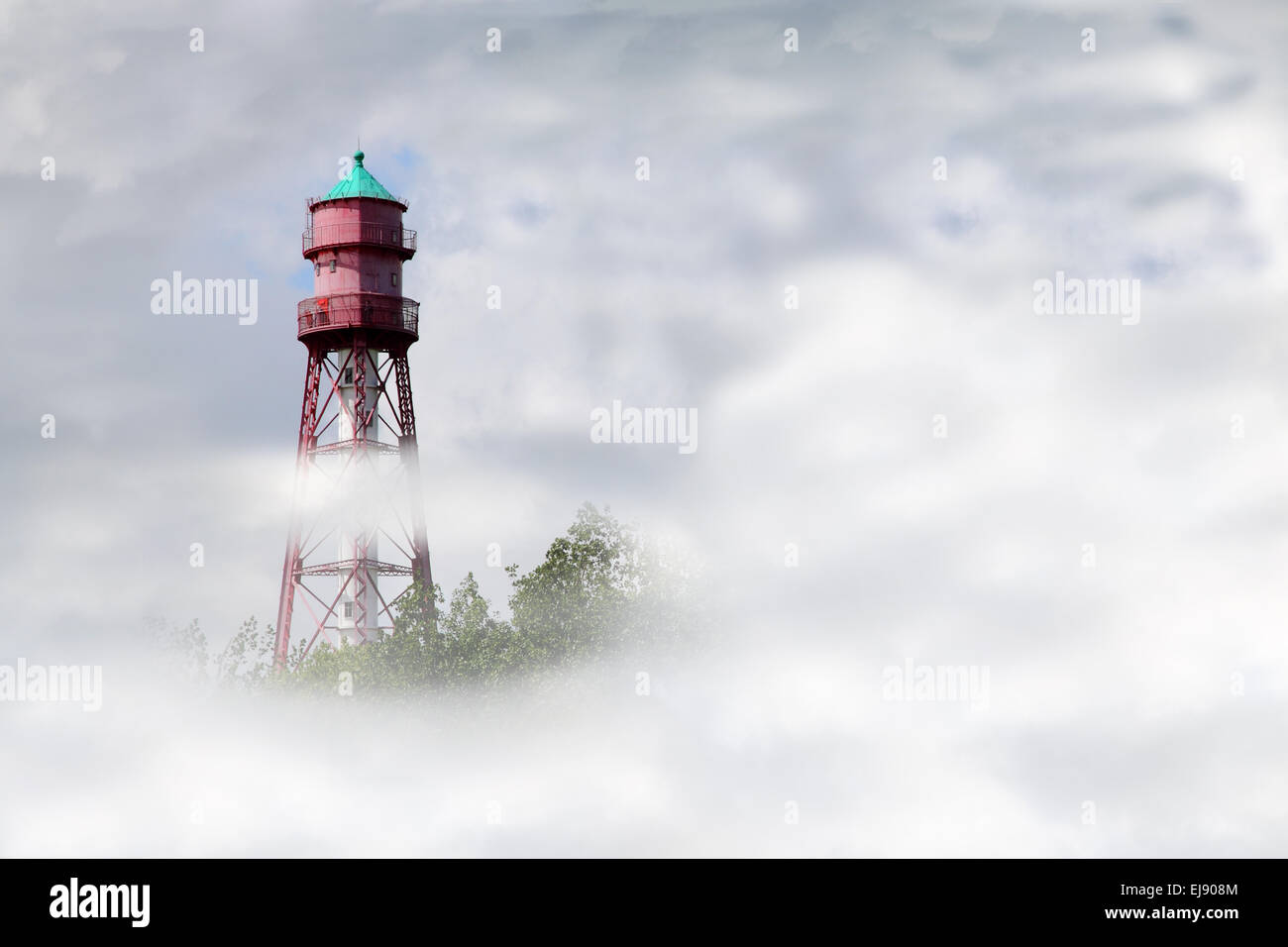 Lighthouse in the Clouds Stock Photo