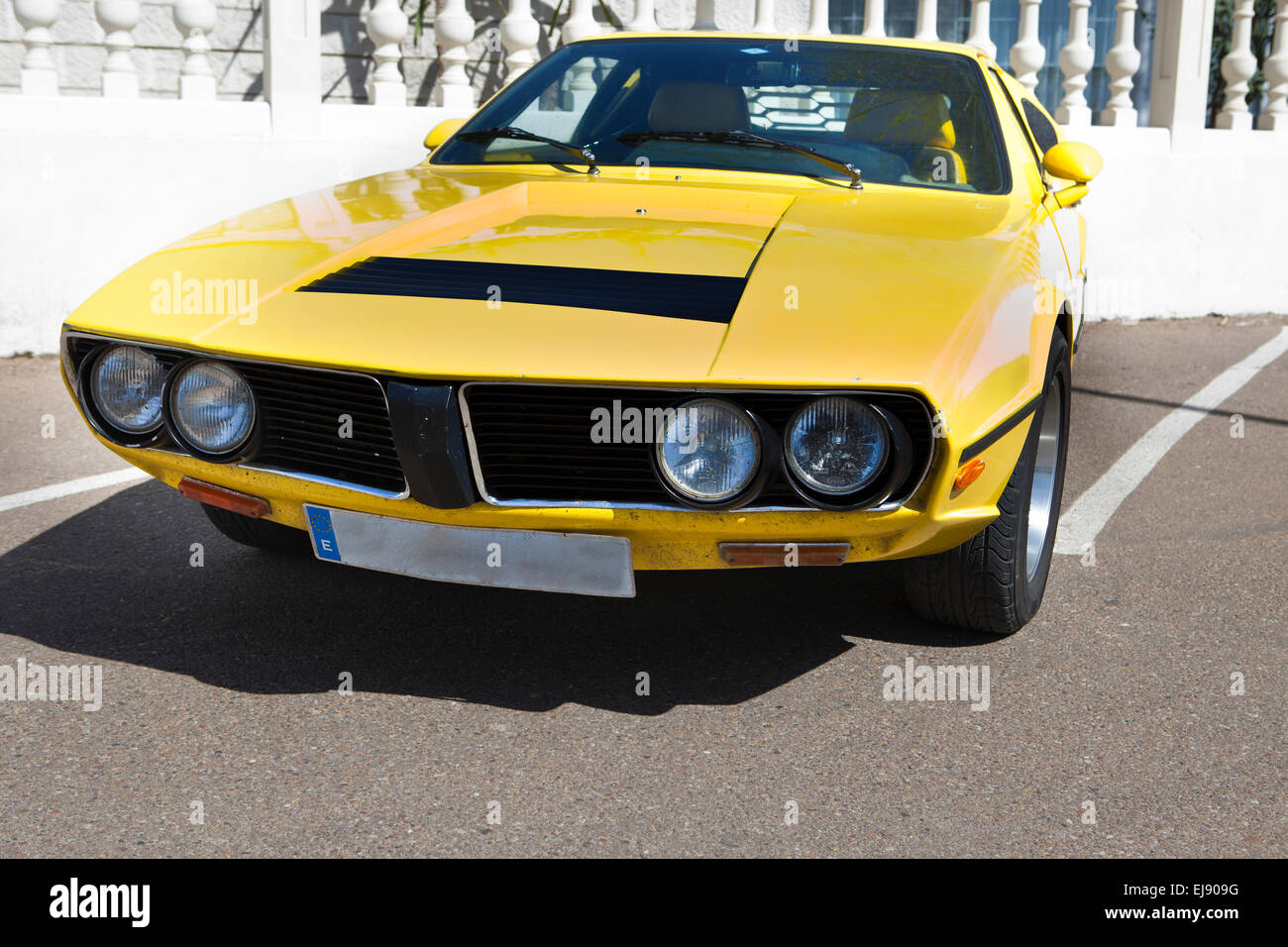 Yellow seventies sports car front view parked Stock Photo