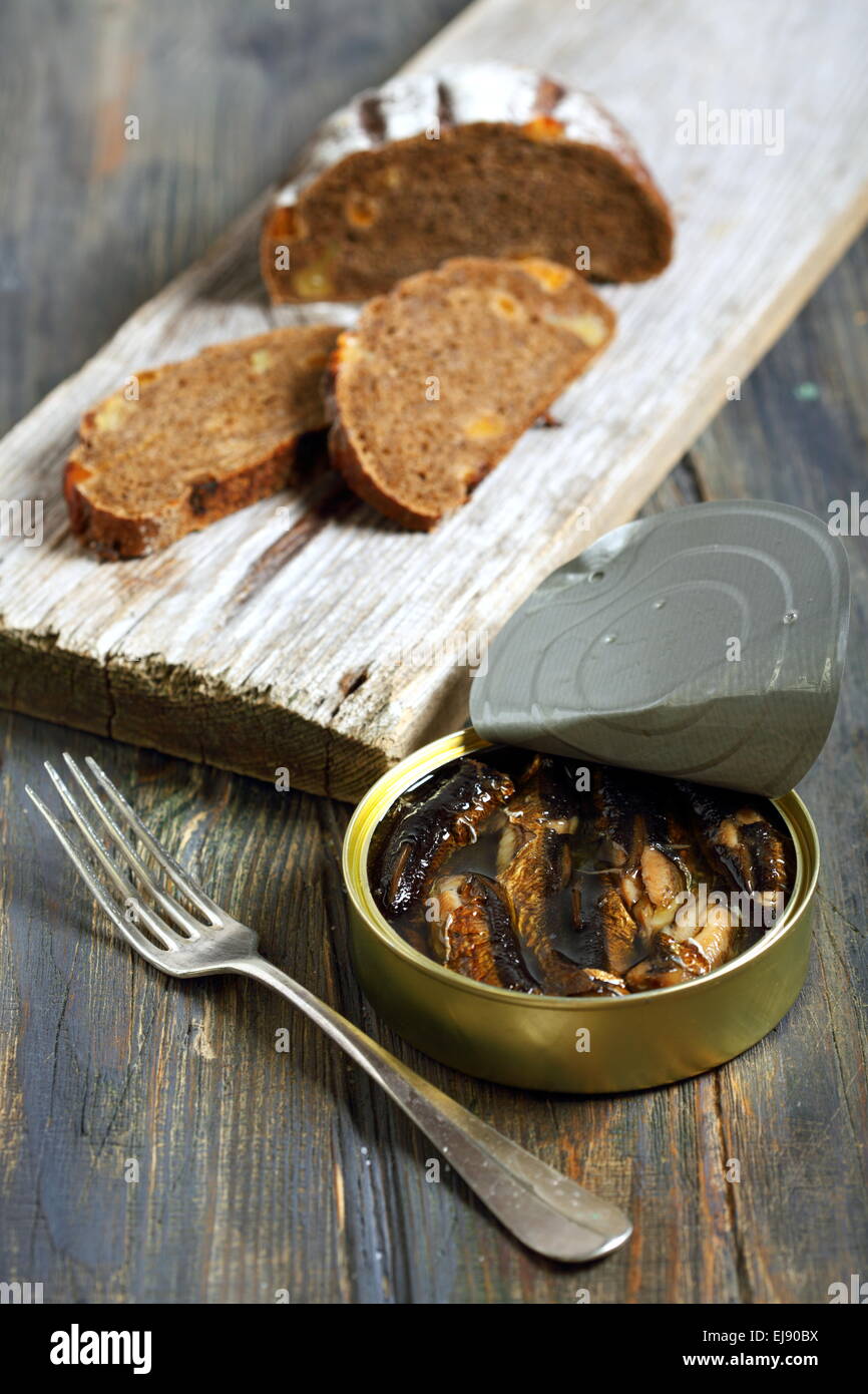Canned fish in a tin. Stock Photo