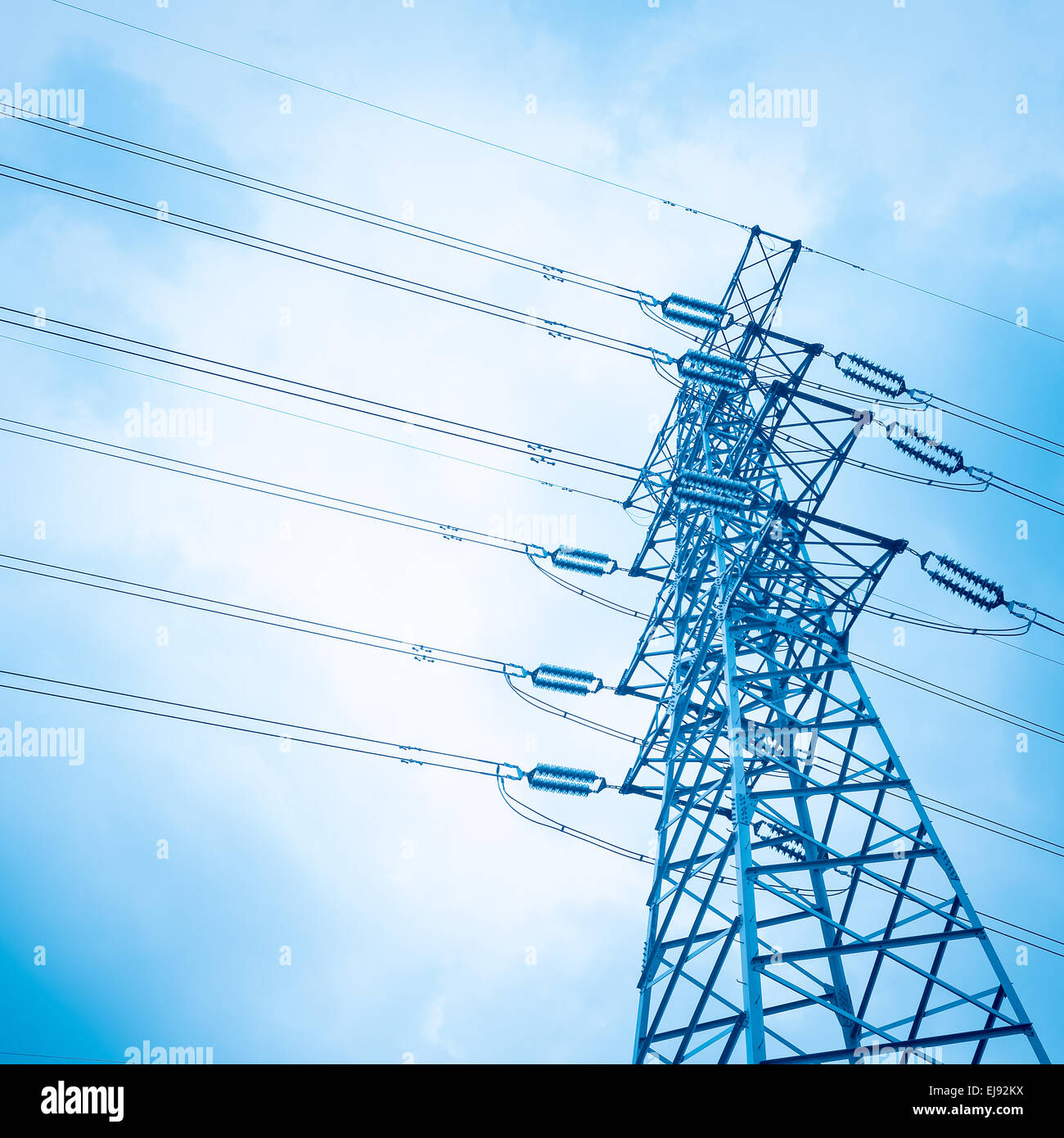 high voltage transmission pylon background Stock Photo - Alamy
