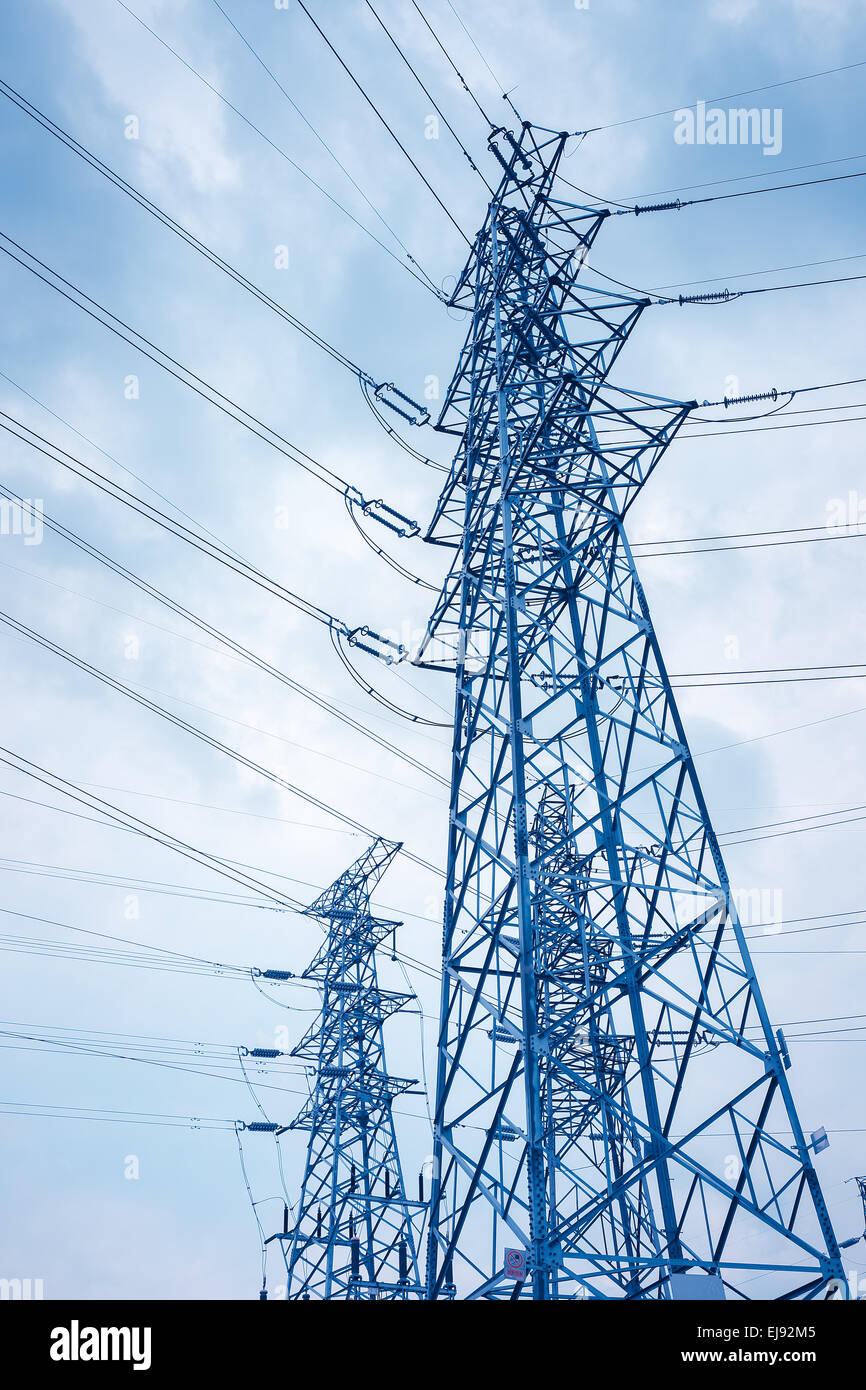 high voltage transmission pylon background Stock Photo