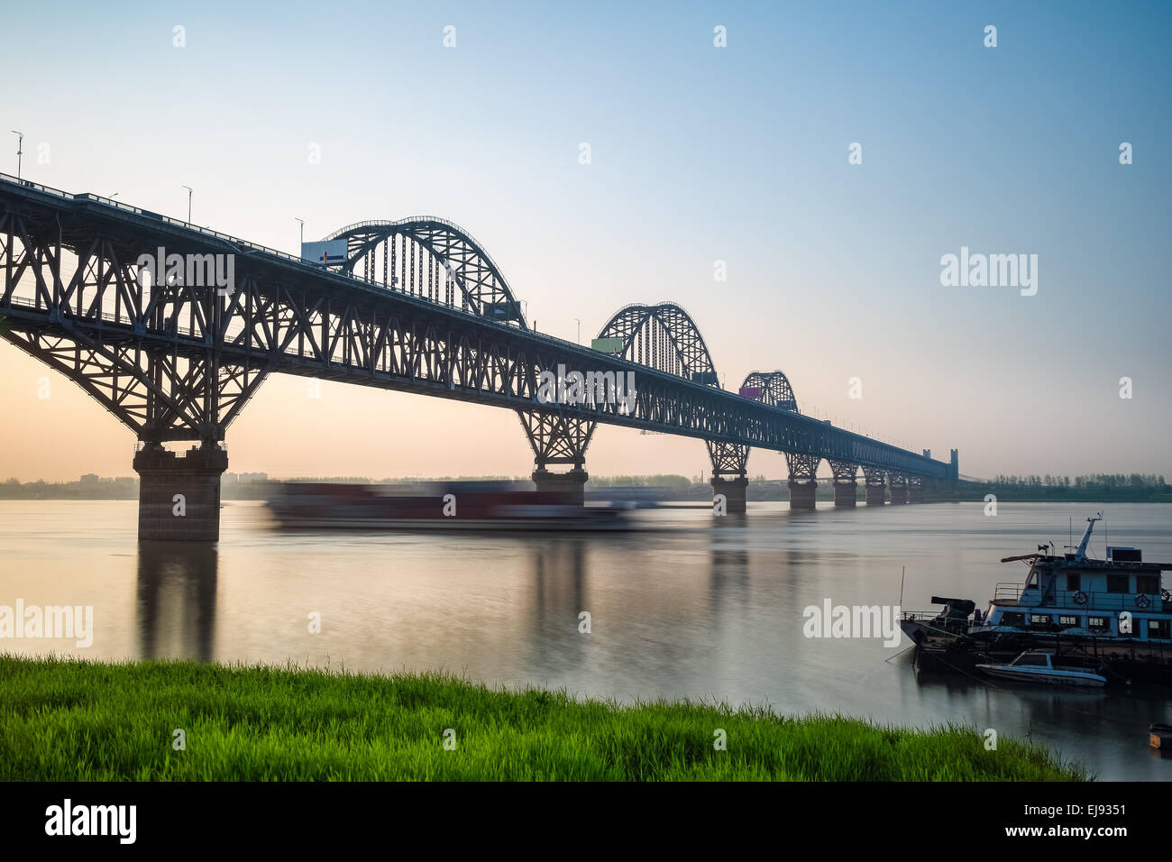 jiujiang yangtze river bridge at dusk Stock Photo