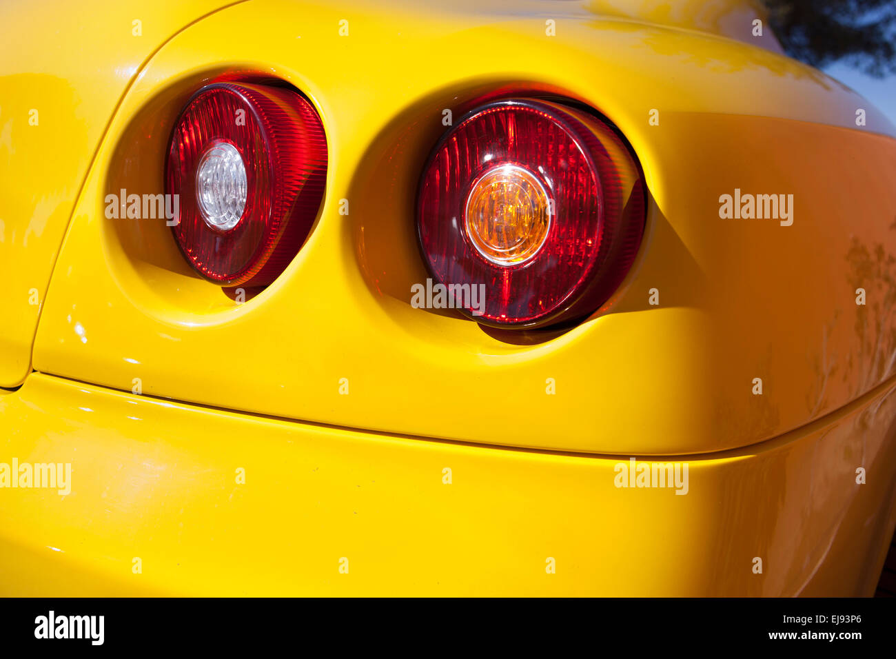 Yellow sports car spot lights. Detail of a luxury car Stock Photo Alamy