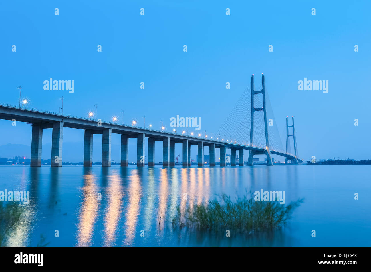 jiujiang yangtze river highway bridge in nightfall Stock Photo