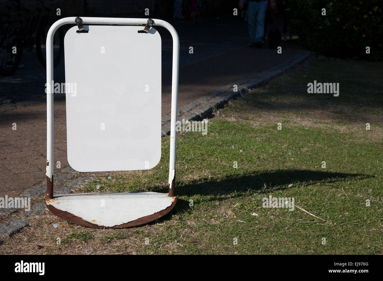 Closeup of Hanging White Blank Sign with Copy Space Stock Photo