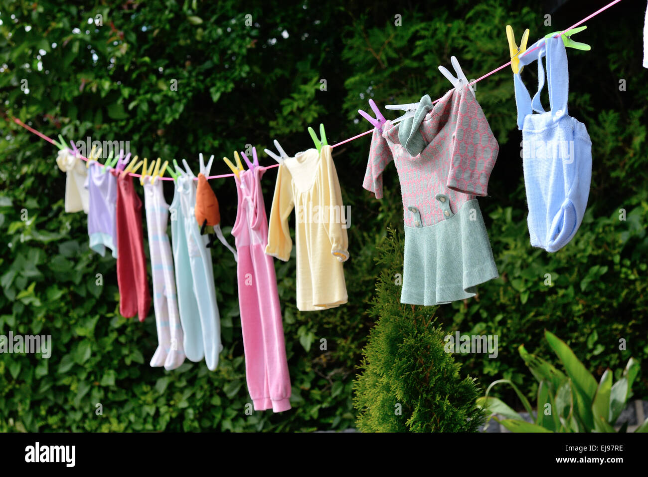 old custom - baby clothes on line Stock Photo