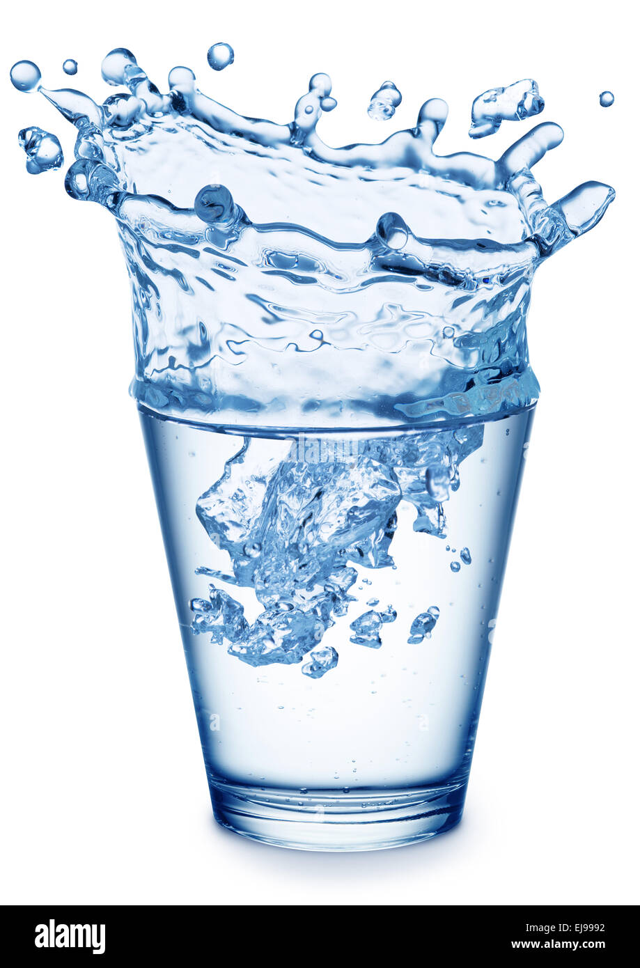 Splash of water in the shape of crown in the glass. File contains clipping paths. Stock Photo