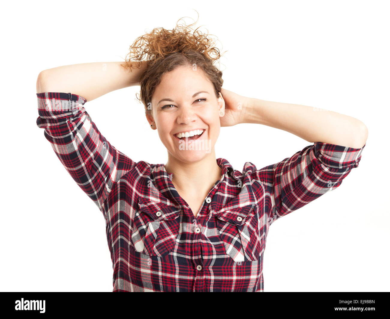 Young happy woman with curly hair Stock Photo