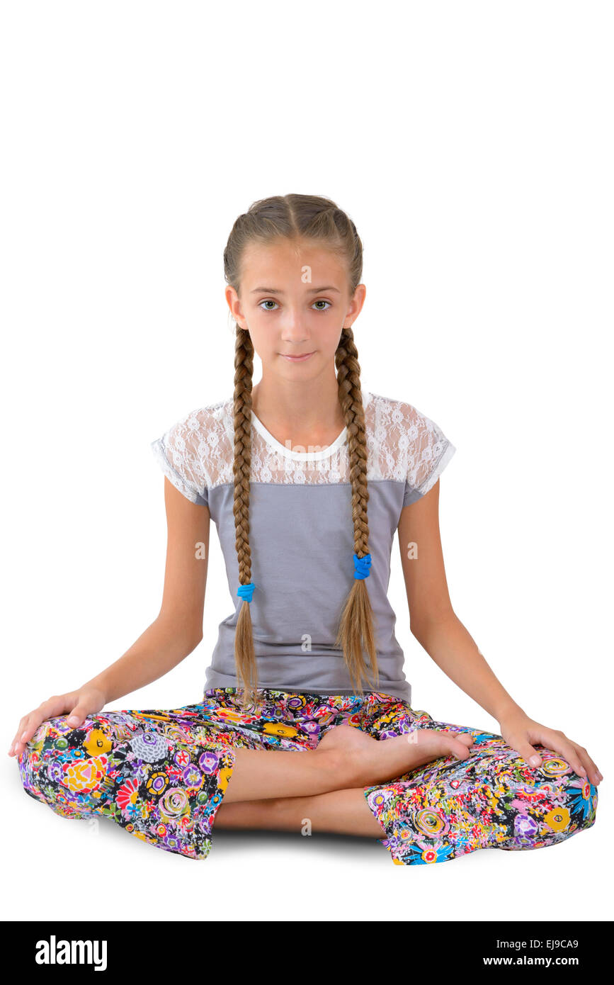Girl sitting in the lotus position Stock Photo - Alamy