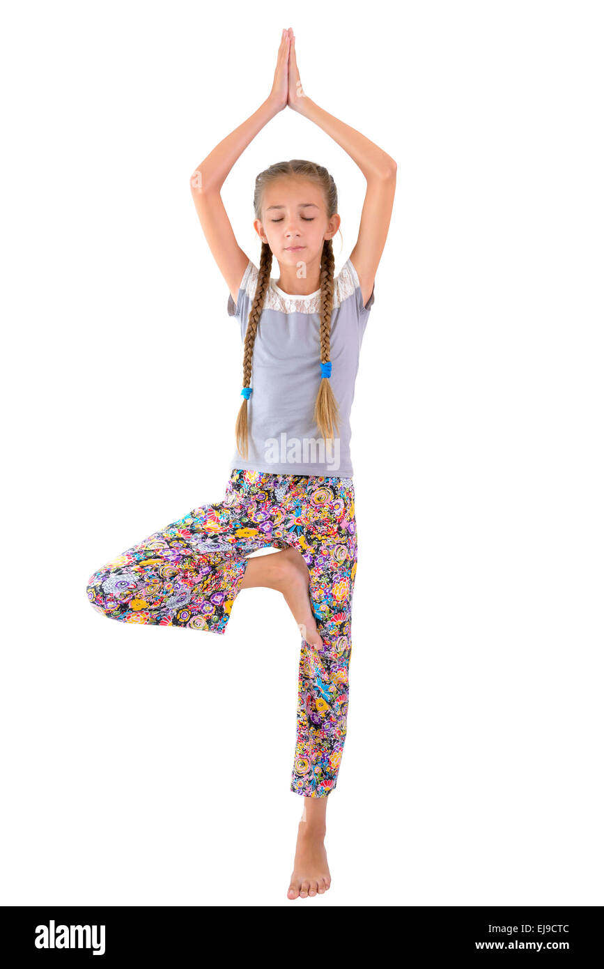 The girl practices yoga Stock Photo