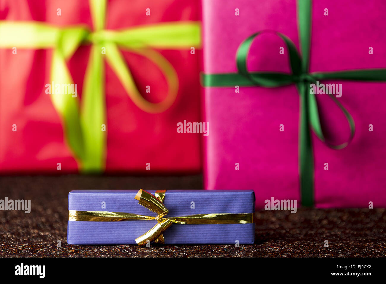 Three presents, bows and ribbons Stock Photo