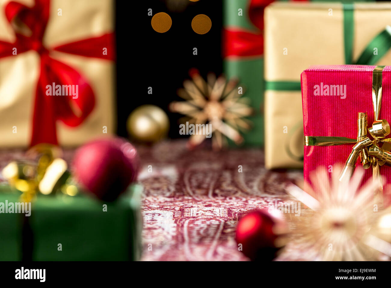 Christmas Gifts Placed on a Festive Cloth Stock Photo