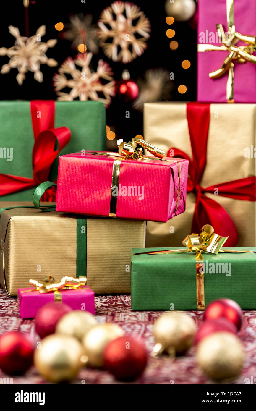 Xmas Gifts Between Ornaments and Stars Stock Photo