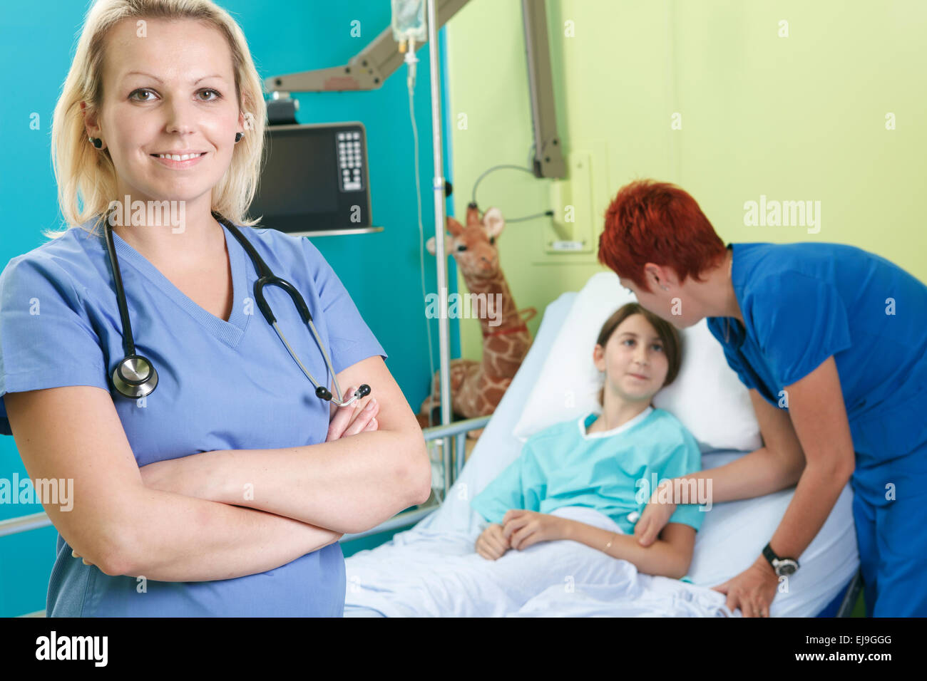 Little girl in hospital bed with the nurse Stock Photo Alamy