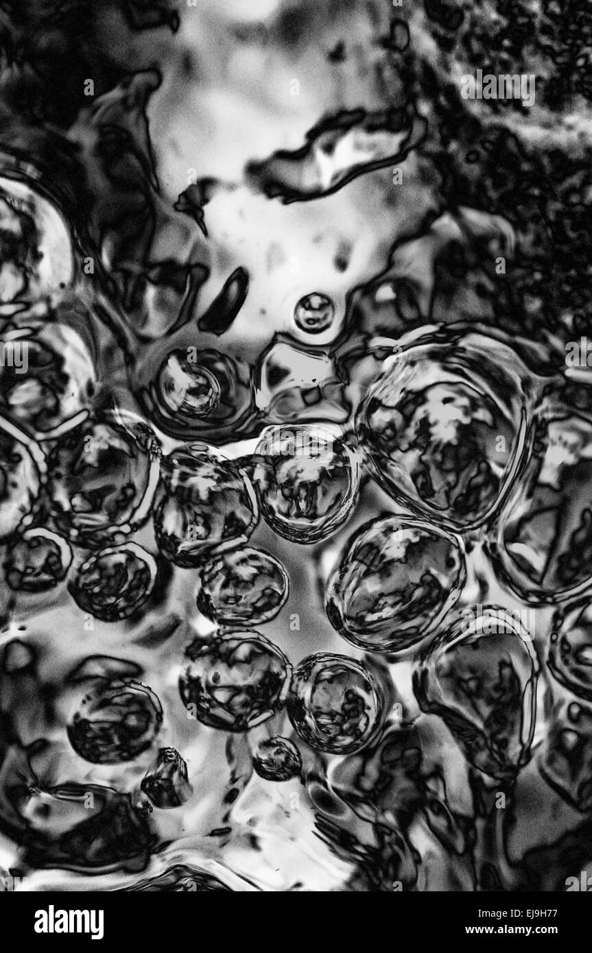 Air bubbles in water-black Stock Photo