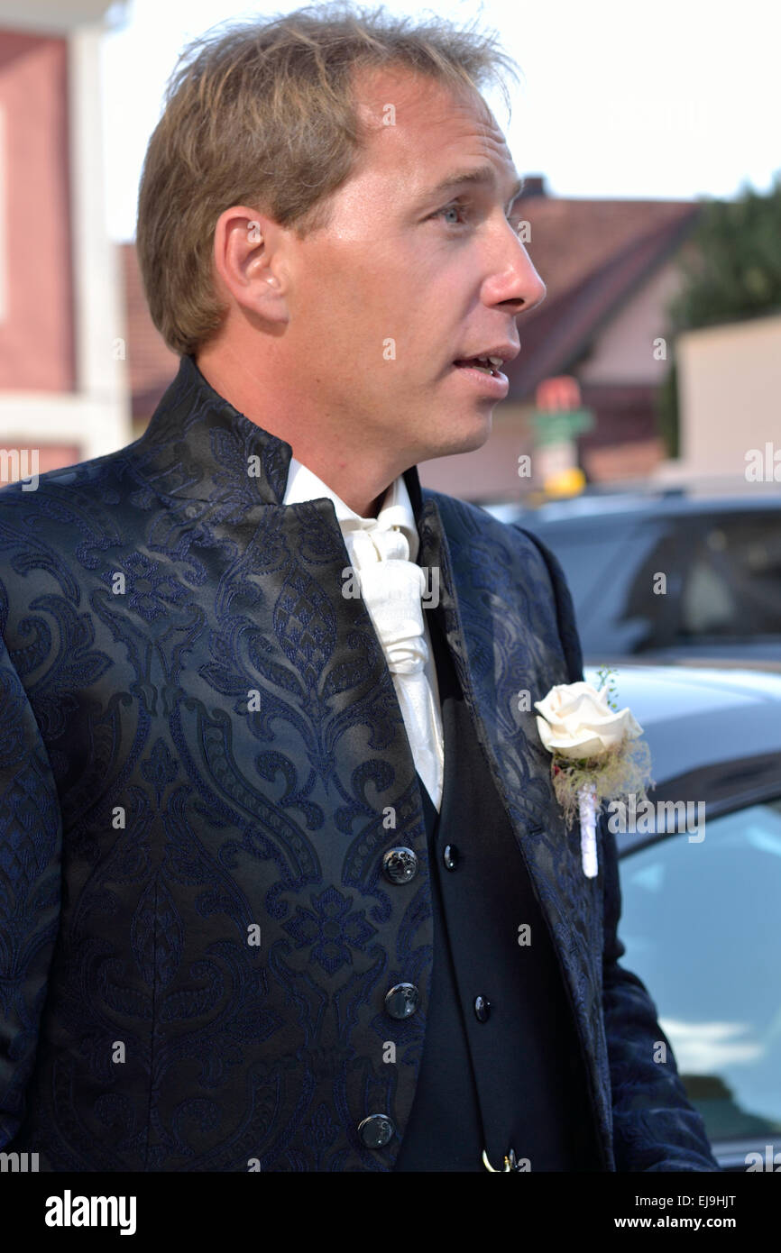 Groom thoughtful and searching Stock Photo