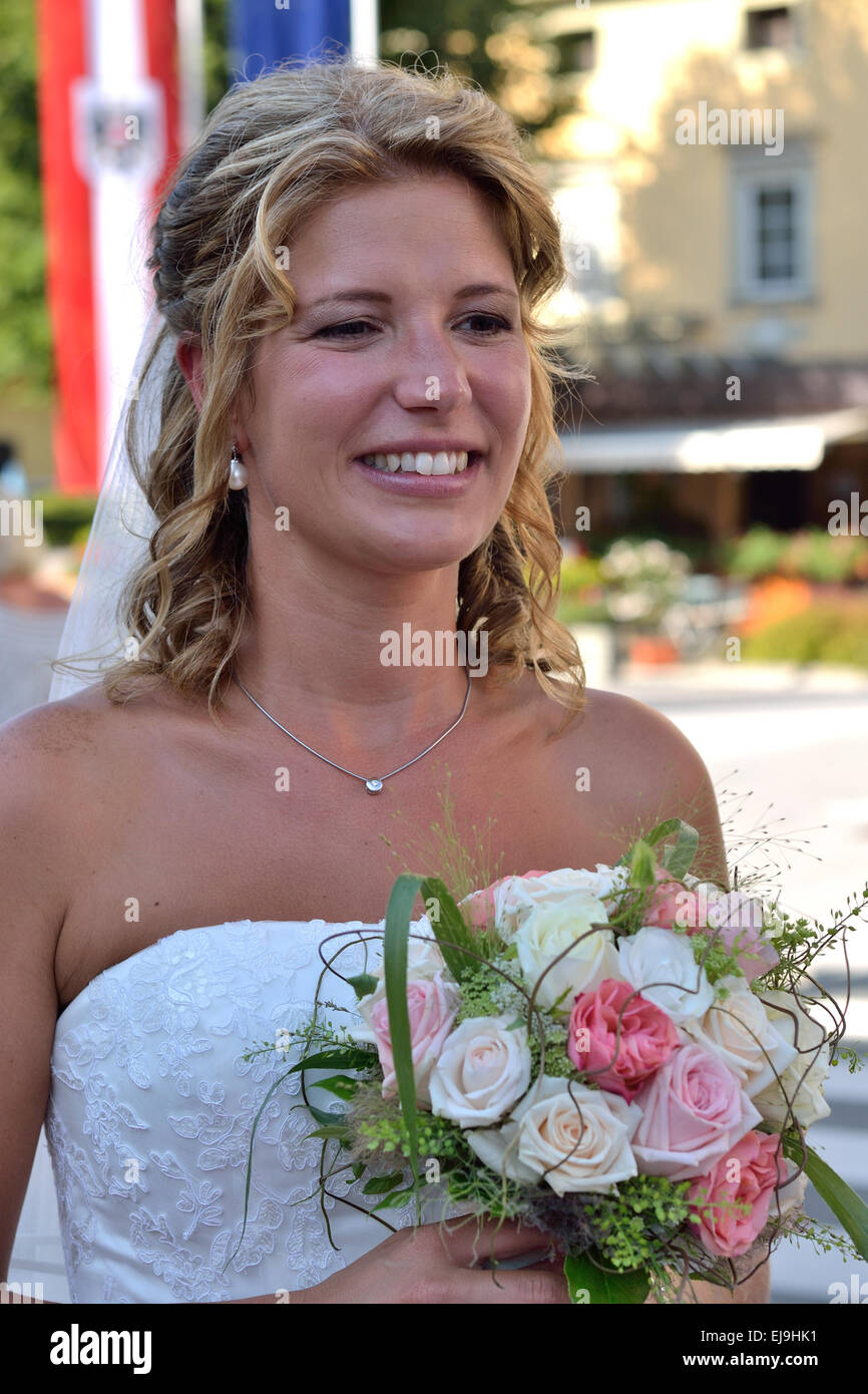 happy bride with bridal bouquet Stock Photo
