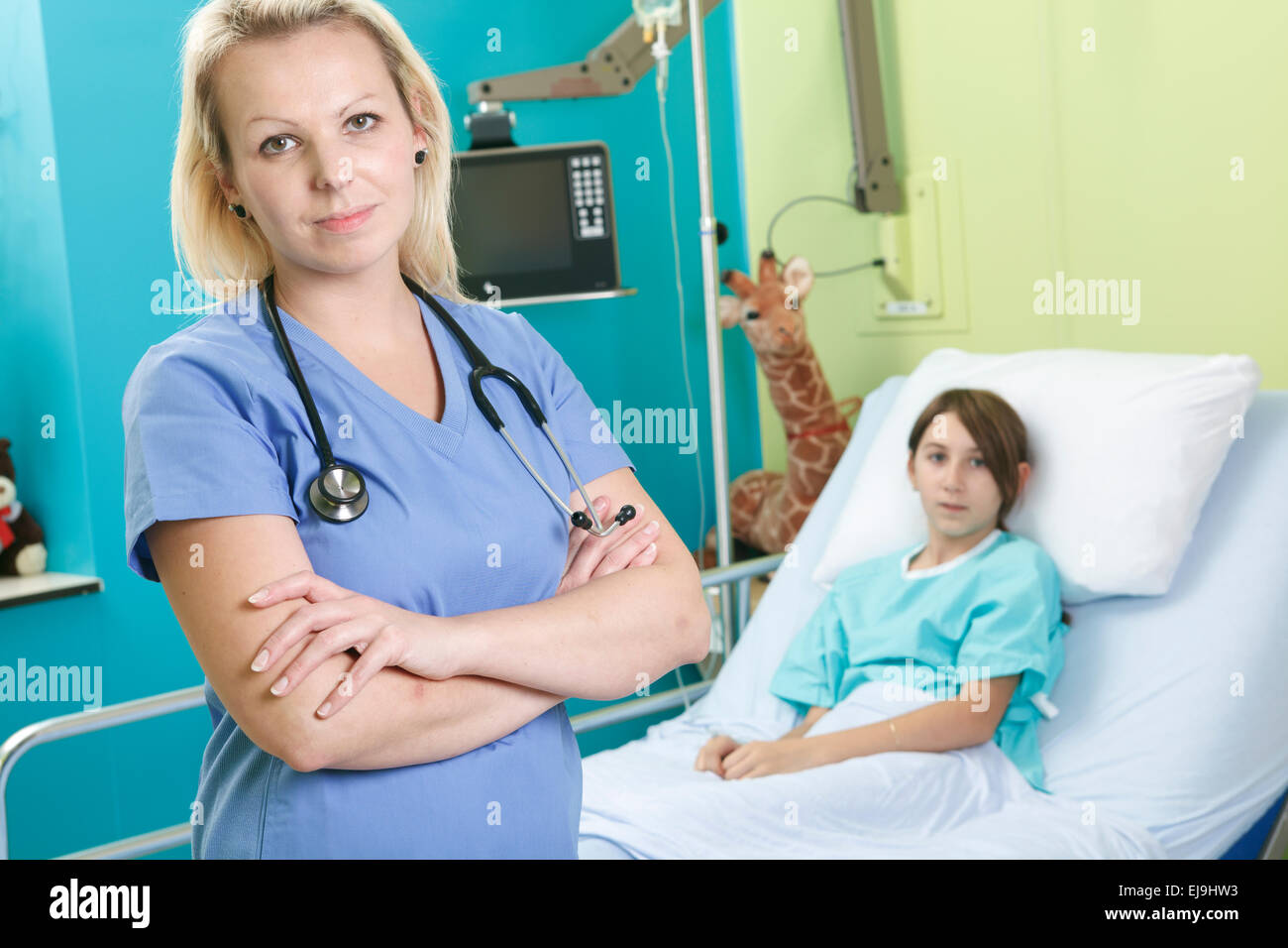 Little girl in hospital bed with the nurse Stock Photo Alamy