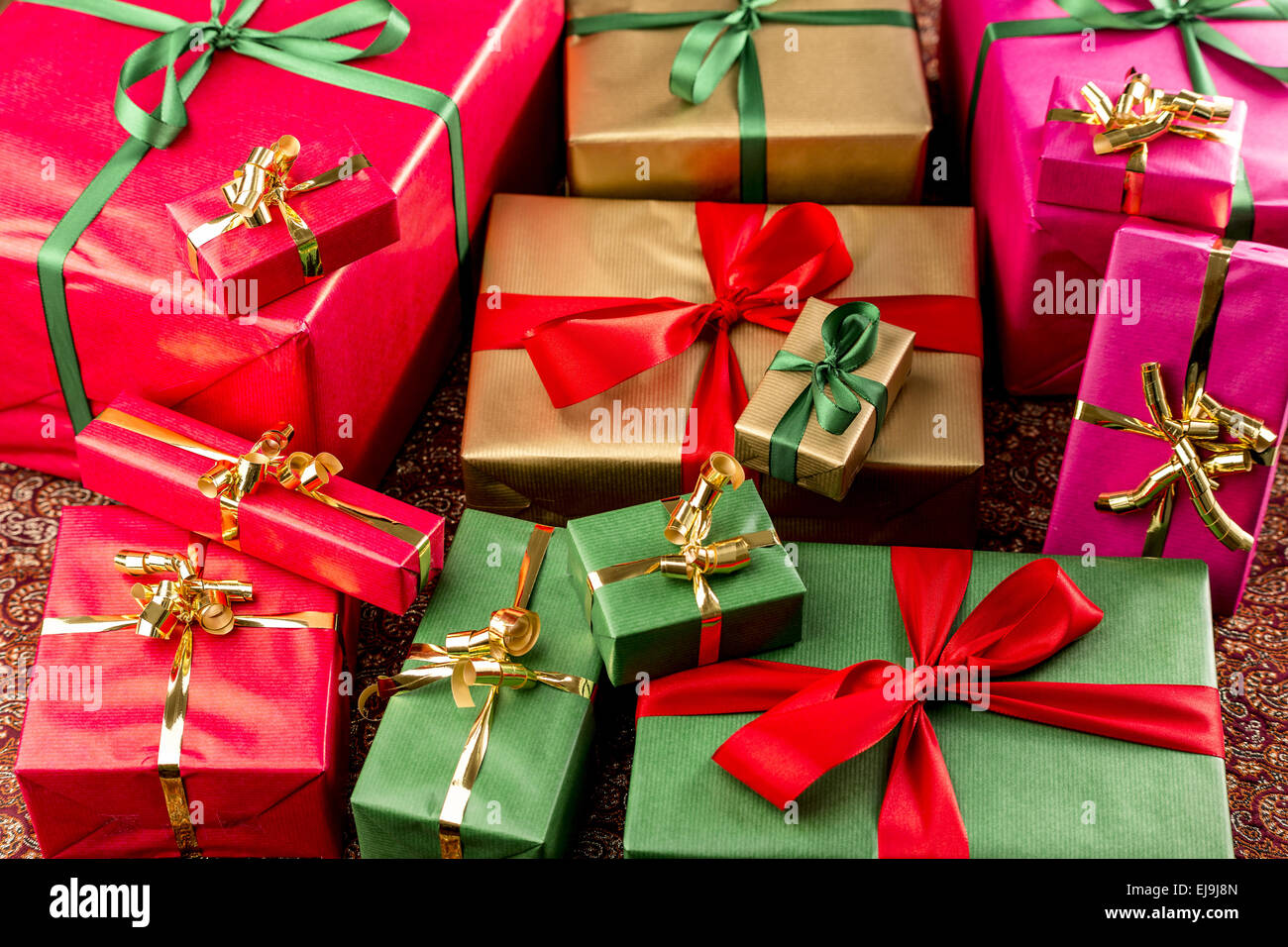 Wrapped Gifts Assorted by Color Stock Photo