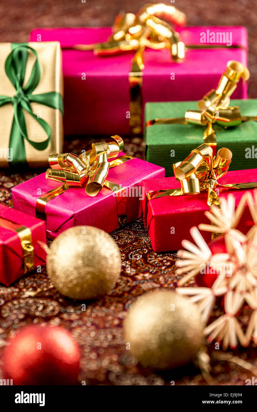 Little Christmas Gifts in Festive Setting Stock Photo