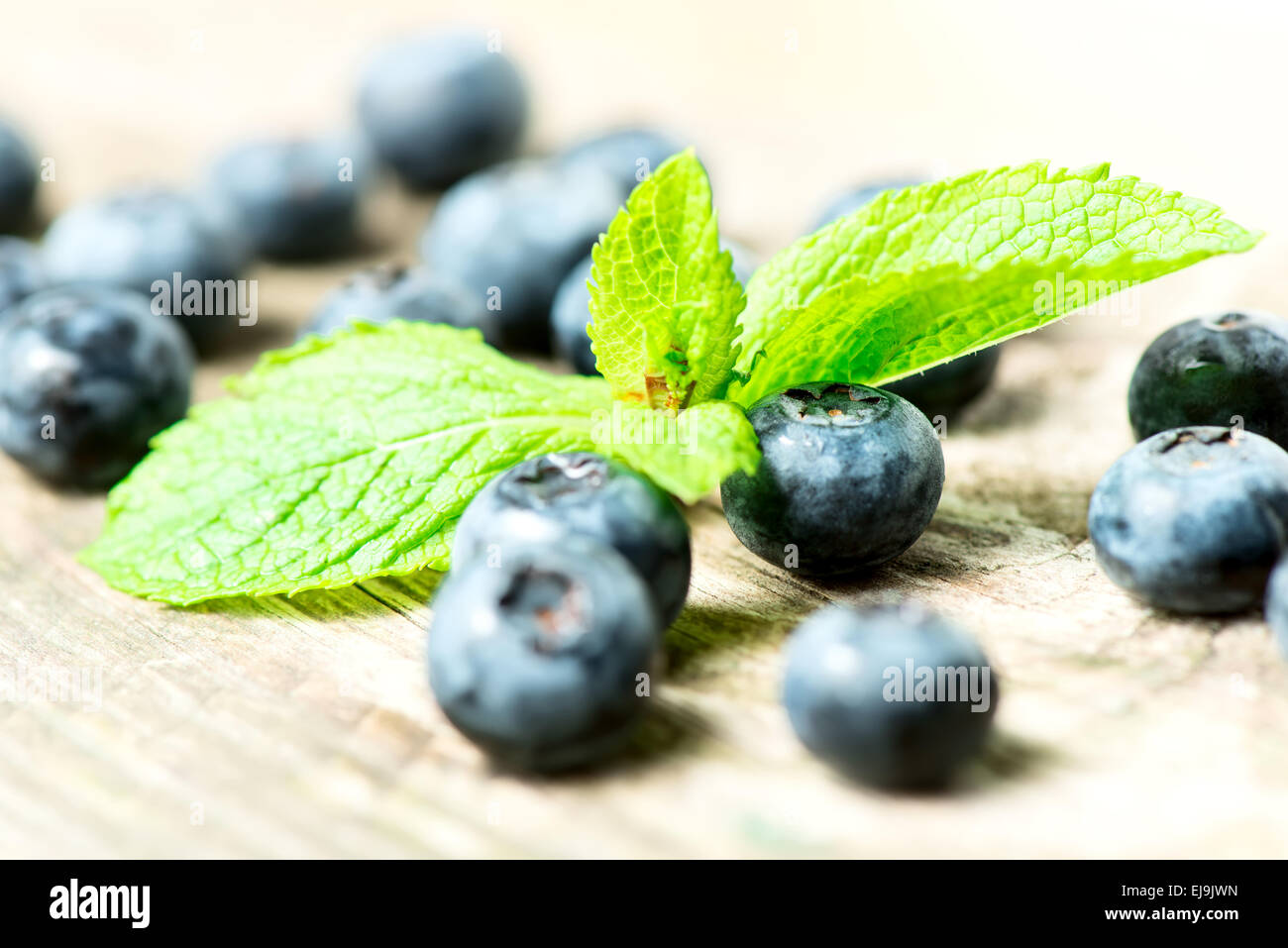 Blueberries on wooden table close up Stock Photo