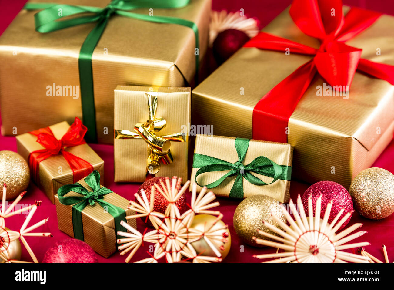 Six Golden Xmas Presents with Bows Stock Photo