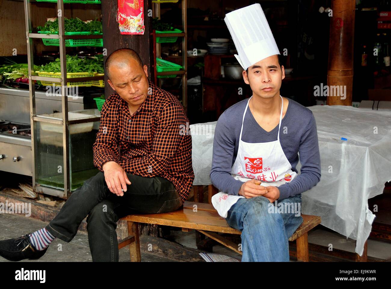 Chef sitting on street hires stock photography and images Alamy