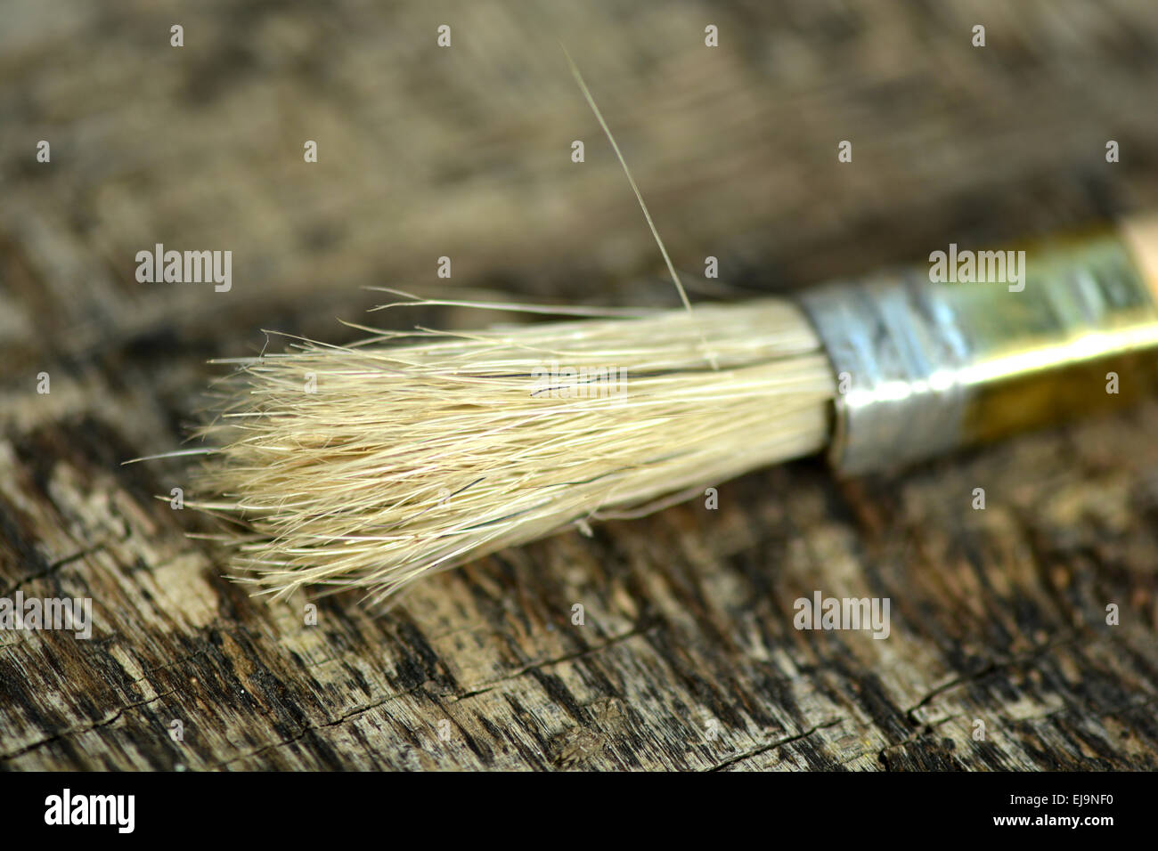 Paint brush on a old wooden background Stock Photo - Alamy