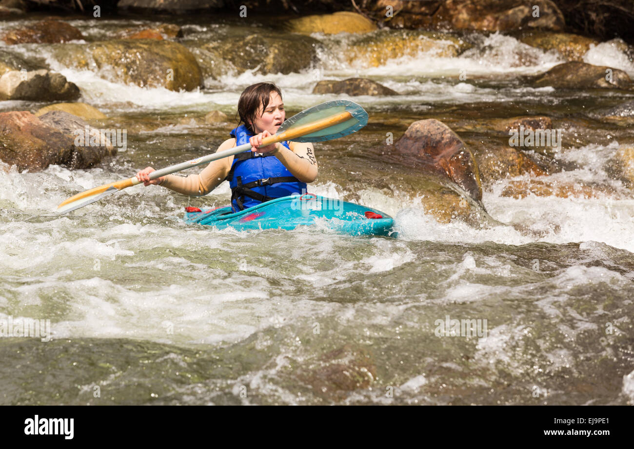 Expert kayaker in white water Buena Vista Stock Photo