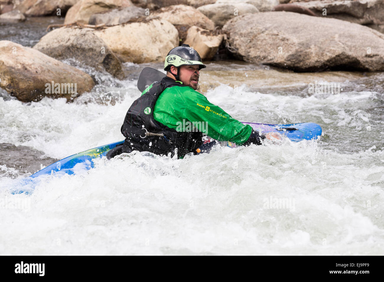 Expert kayaker in white water Buena Vista Stock Photo