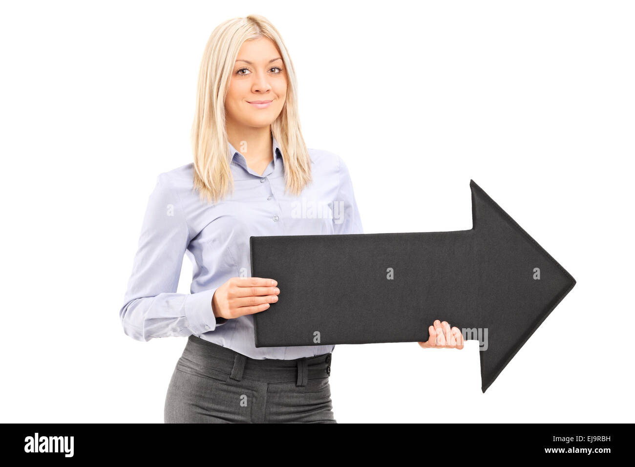 Woman holding big direction arrow hi-res stock photography and images ...