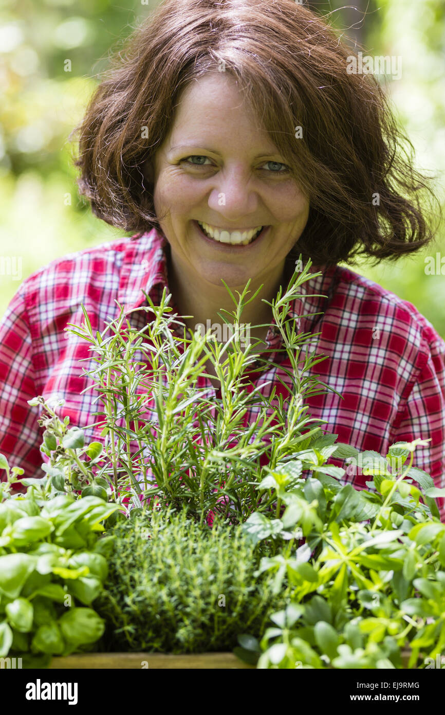 young woman with herbs Stock Photo